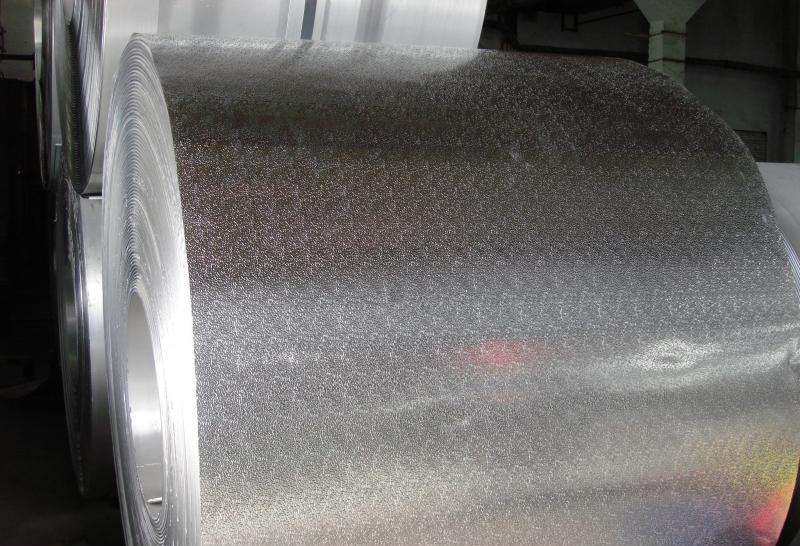 Stucco embedded aluminum cladding roll